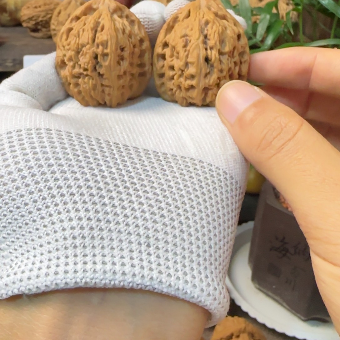 龙***渊文玩核桃把件南将石炮弹38尺