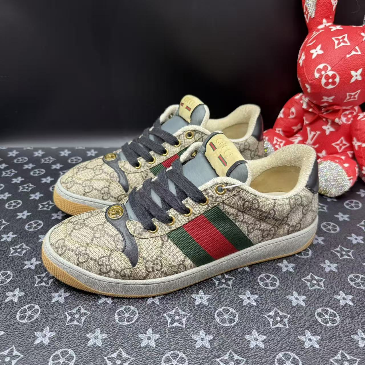 95新 GUCCI/古驰 男士棕老花满印脏脏鞋38.5欧码 xx001