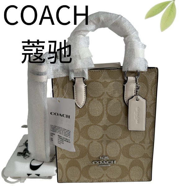 99新 COACH/蔻驰 老花拼白琴谱手提斜挎包G25116921底长14X17