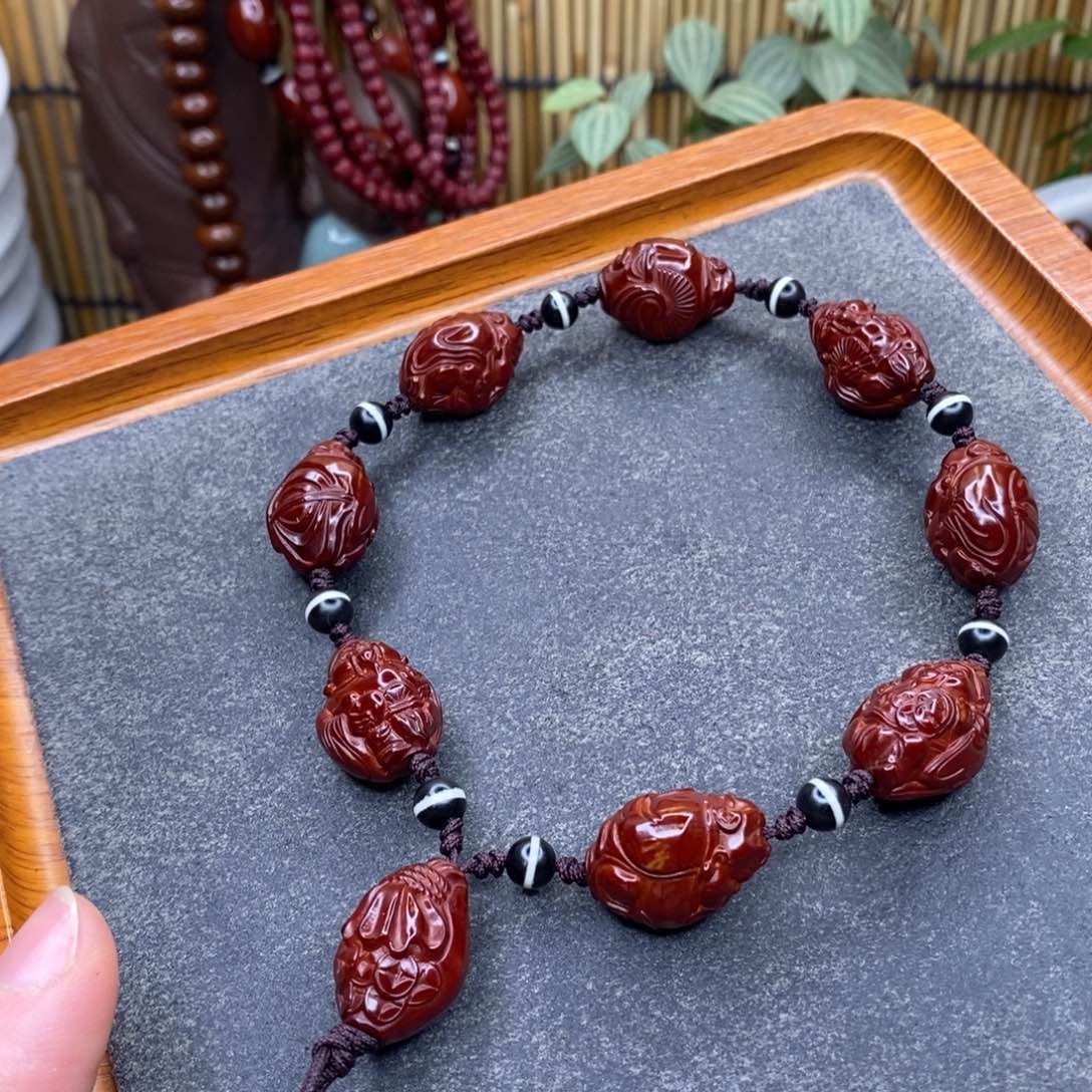 橄榄核吊坠八方来财