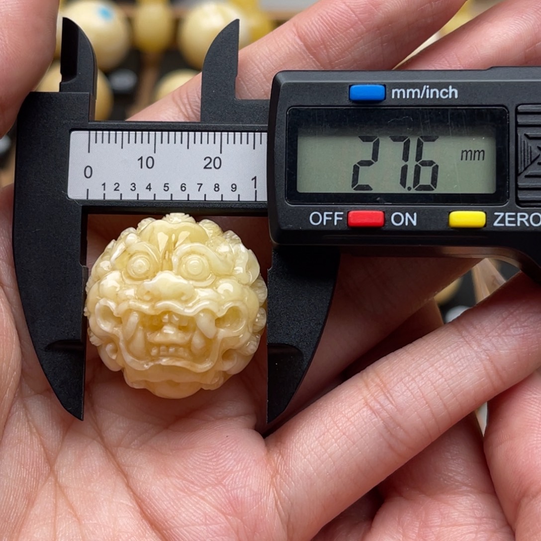 %***某琥珀未镶嵌裸石蜜蜡龙珠微瑕静