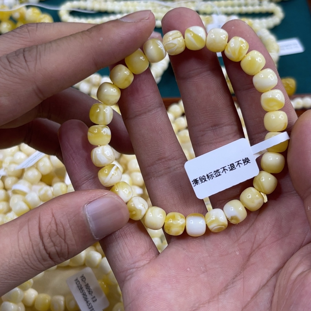 琥珀未镶嵌手链8.5mm金白妖花溶洞