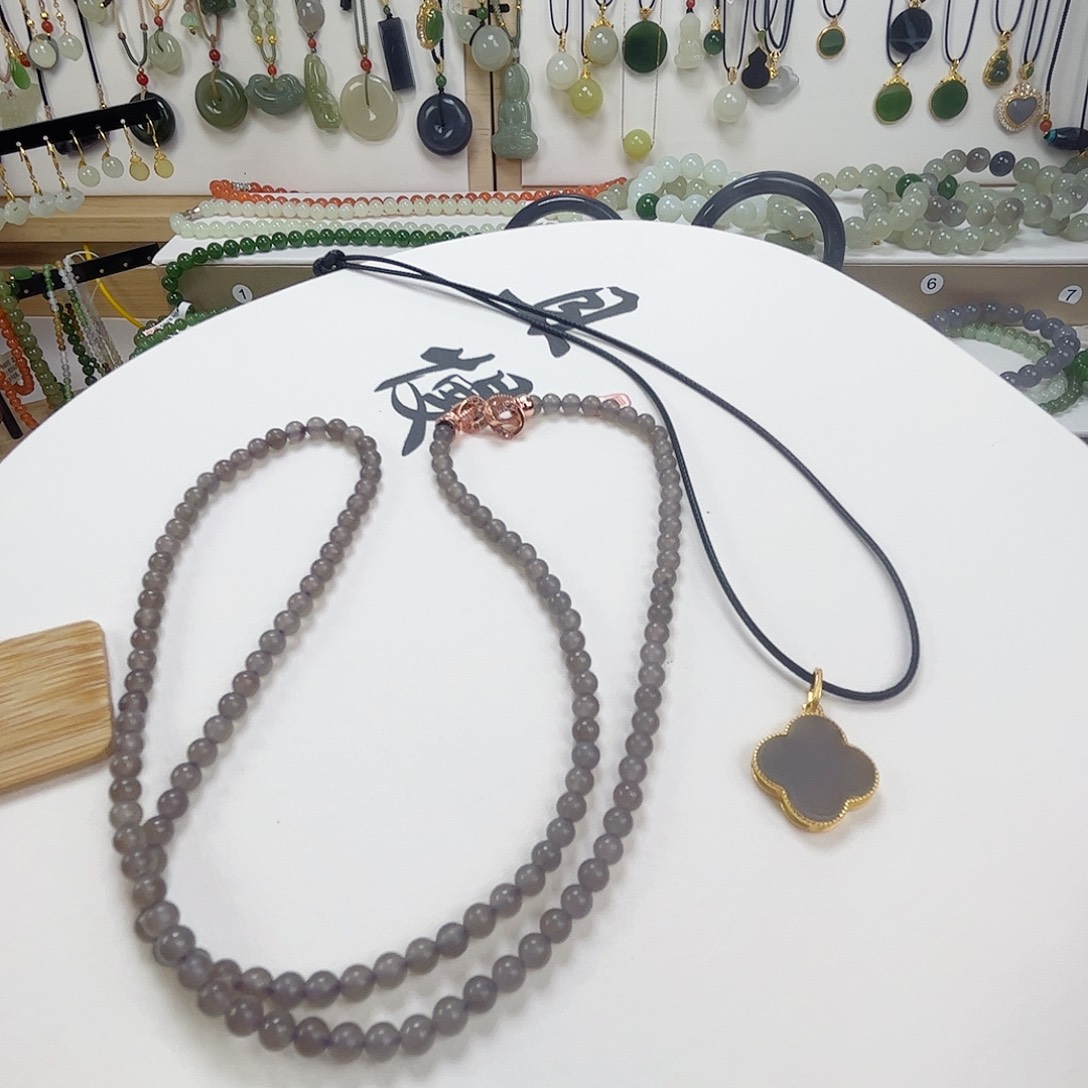 锦***.和田玉未镶嵌颈饰