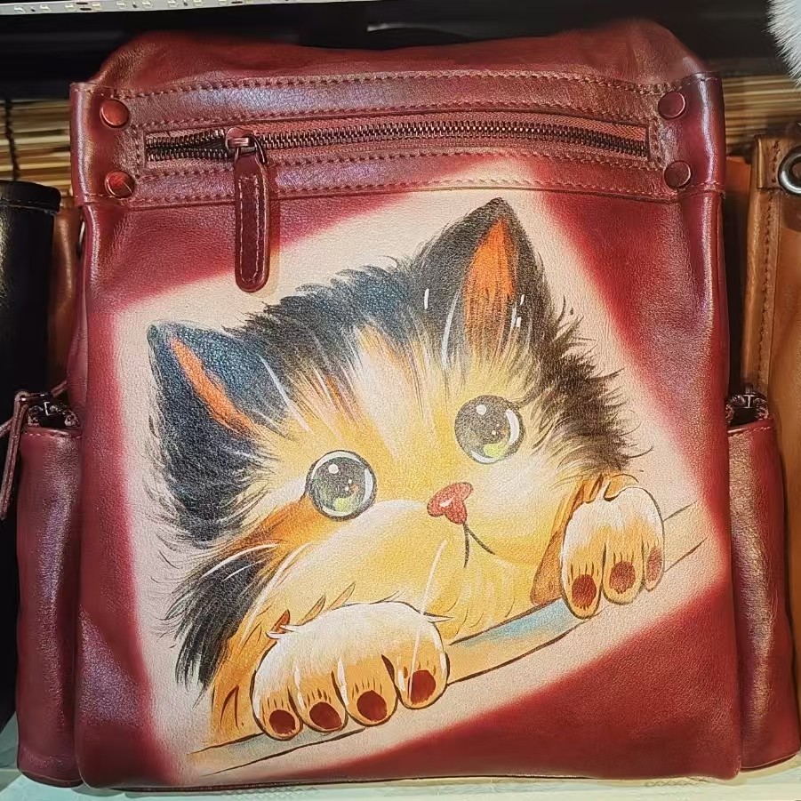 女款头层牛皮手绘猫咪双肩包