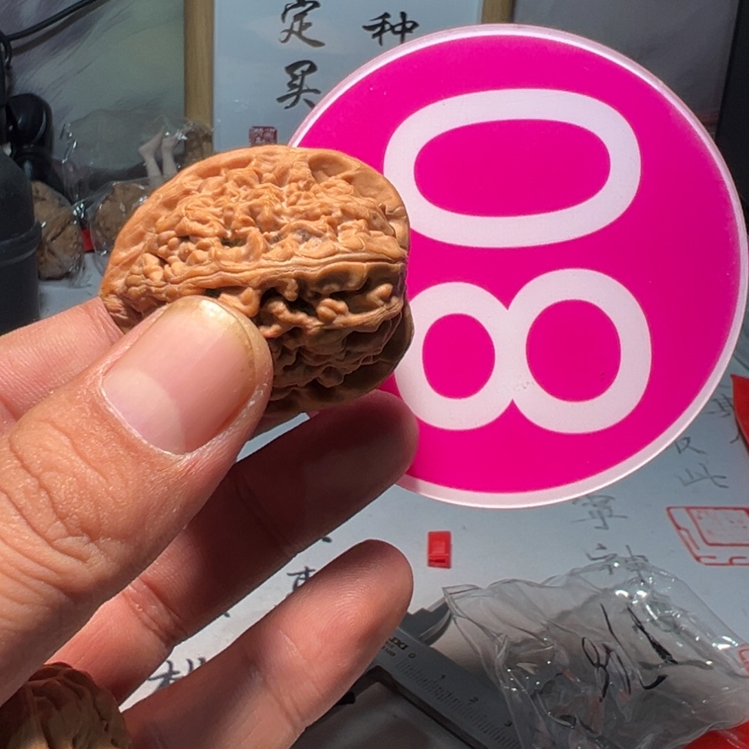 T***e文玩核桃，粉色80号