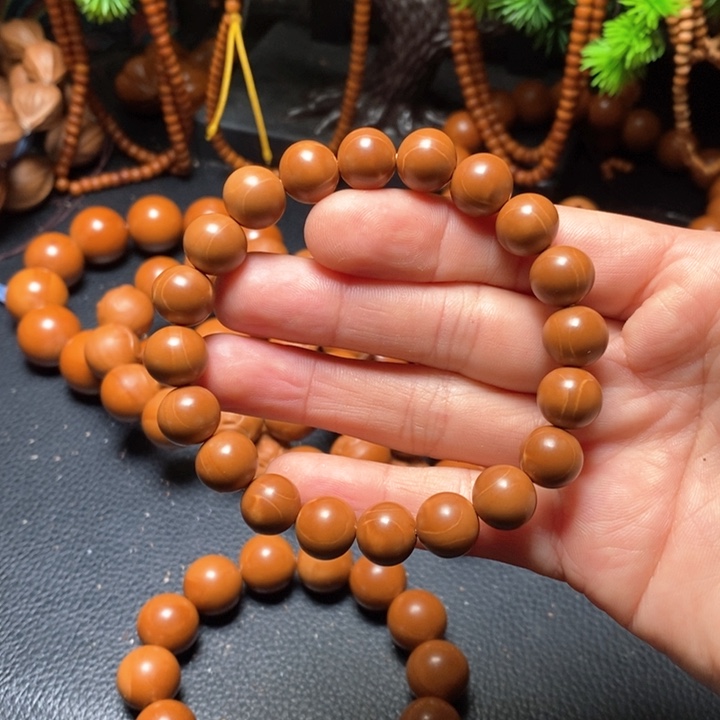 橄榄核手串1.1红料光珠