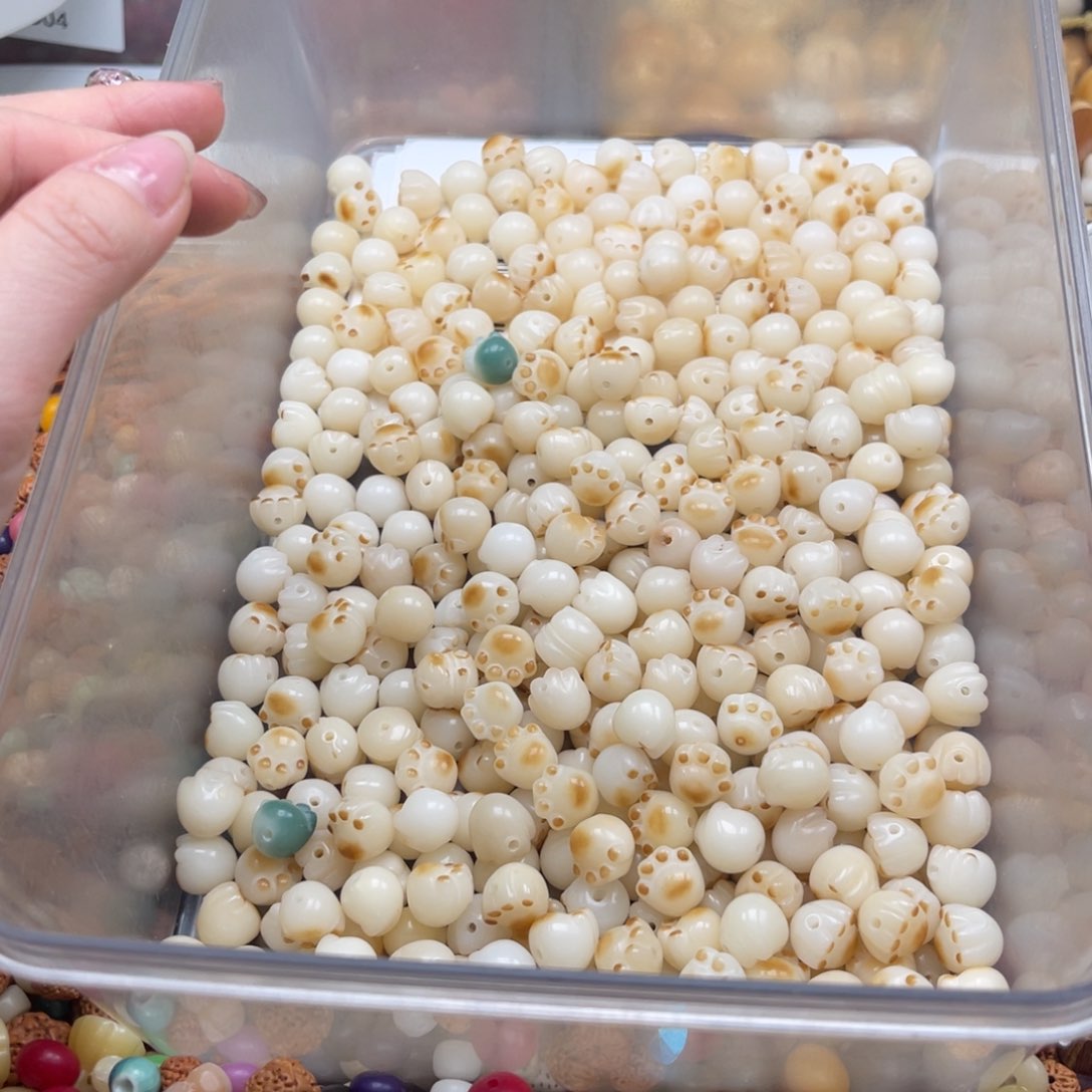 吊坠白玉菩提d x01/12mm/40颗炭烧猫爪瑕