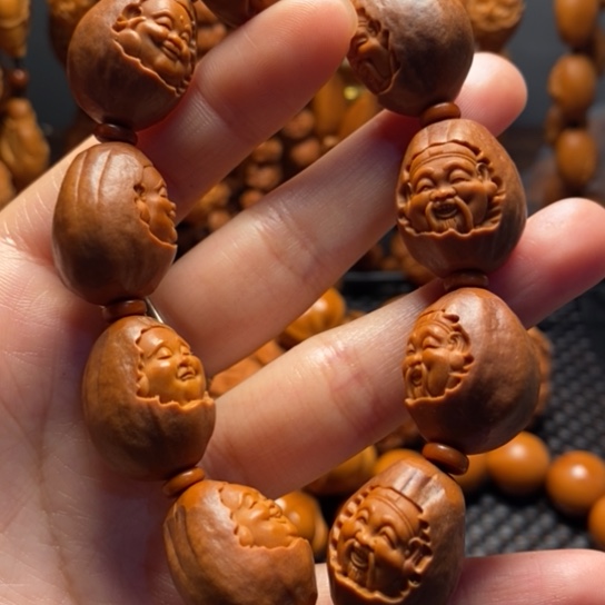 橄榄核吊坠包衣财迷