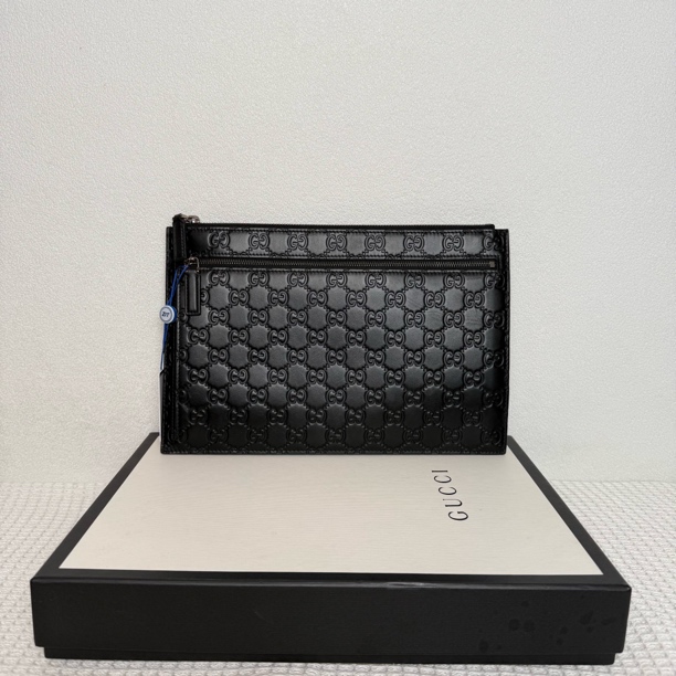 99新 GUCCI/古驰 7882/男士时尚黑色全皮压纹手拿包