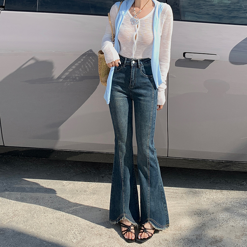 2025年秋冬新款微喇开叉毛边牛仔裤女大码胖MM200斤高腰喇叭长裤