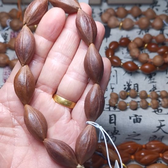 橄榄核手串/手链橄榄核手串 1.5 三花铁核紫皮料微瑕疵