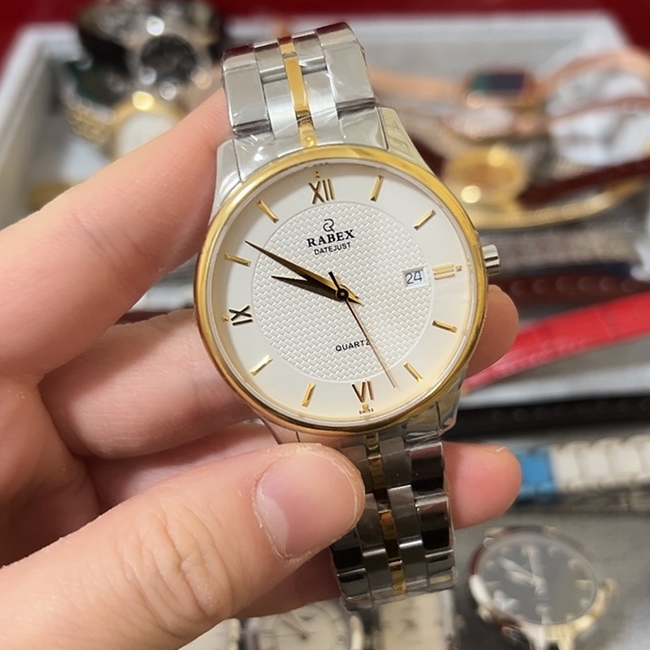 龙***涯钢牛皮（革）钢石英机芯