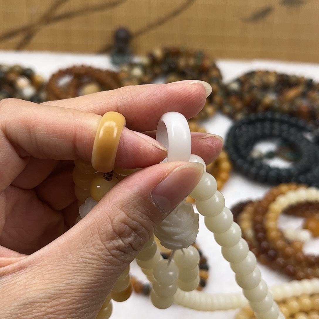 吊坠菩提根/象牙果?****?两个跑环内径卡12（黄色白色）