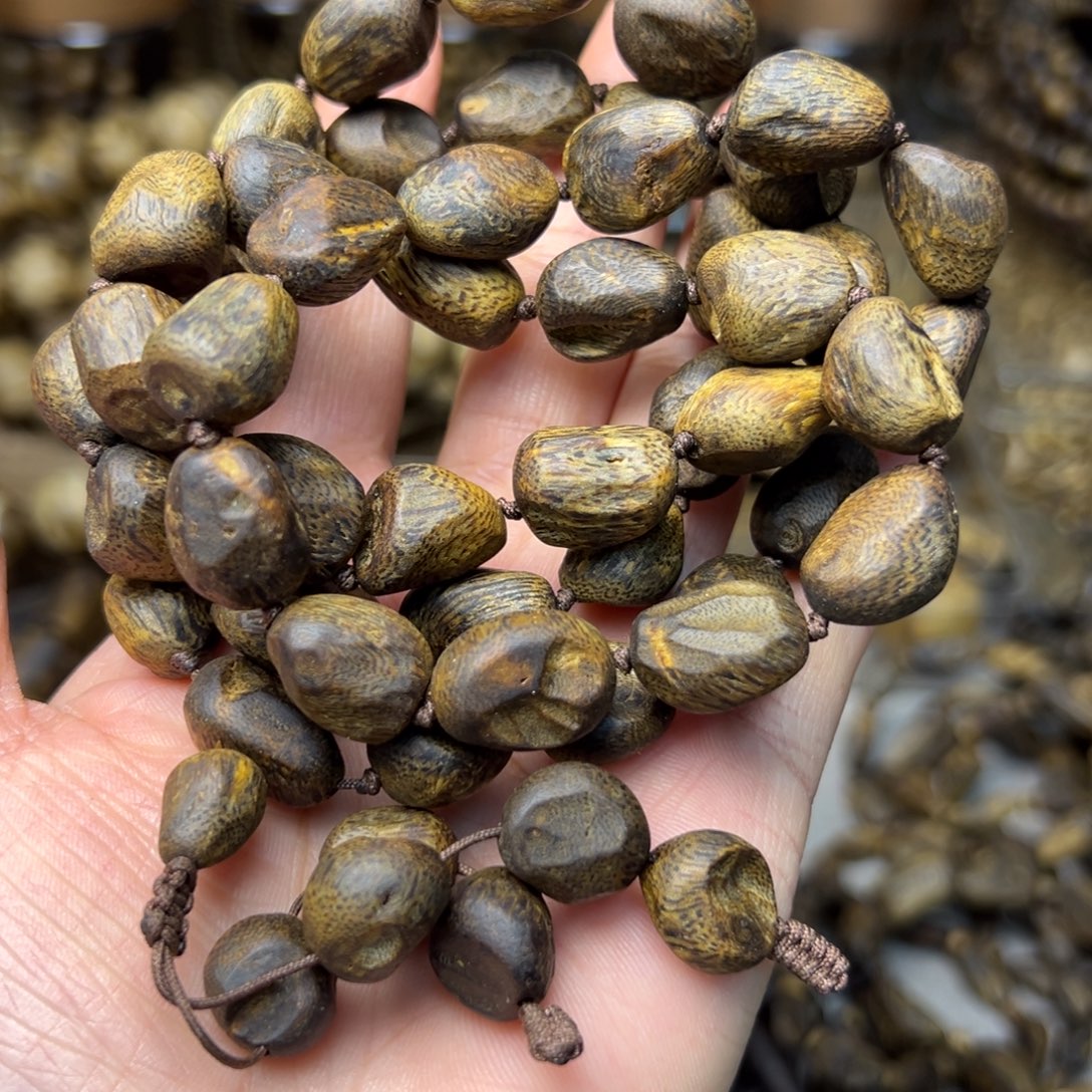 绕***柔手串沉香树丁包壳沉水醇化老料多圈58克发一条