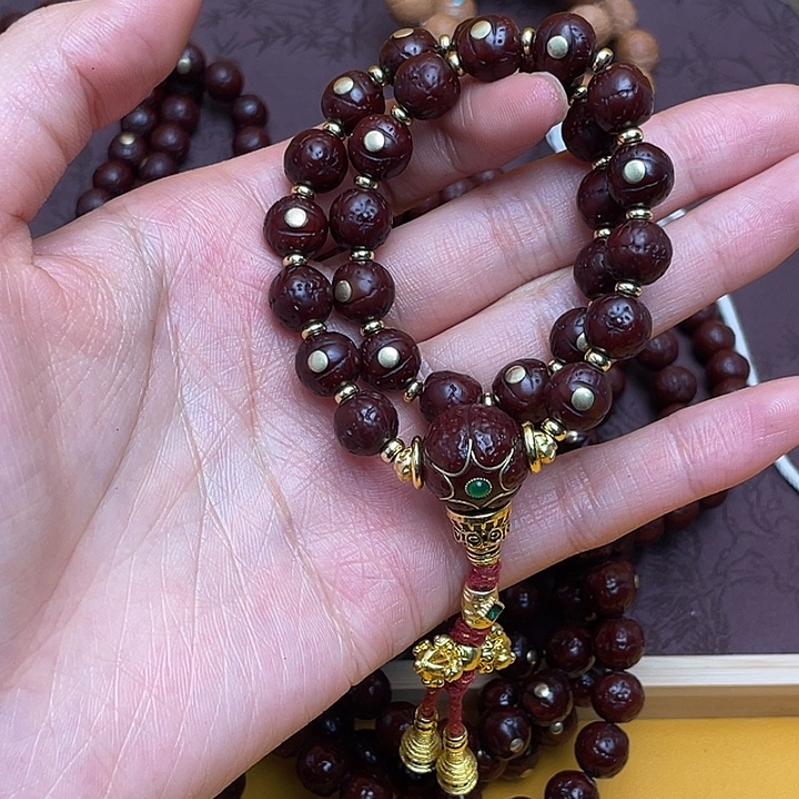 公***七凤眼菩提吊坠手持镶嵌7