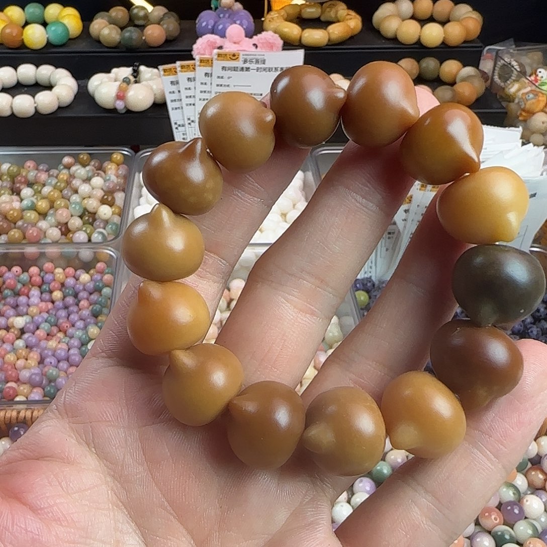 手串菩提根/象牙果微瑕卡18焦糖可可猫头手串一条