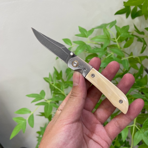 乌兹钢折叠刀猛犸冰牙盘玩收藏锋利雪花纹乌兹