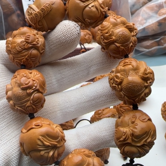 橄榄核手串雕刻工艺