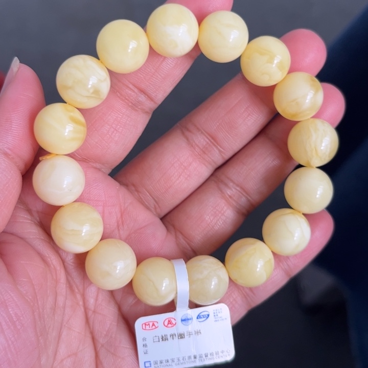 琥珀未镶嵌珠宝奇石M67号12.6+浓白妖花