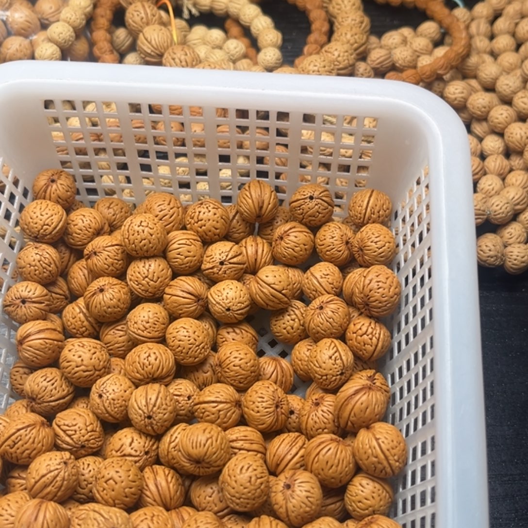 黄***牙吊坠文玩核桃小桃核散籽批发