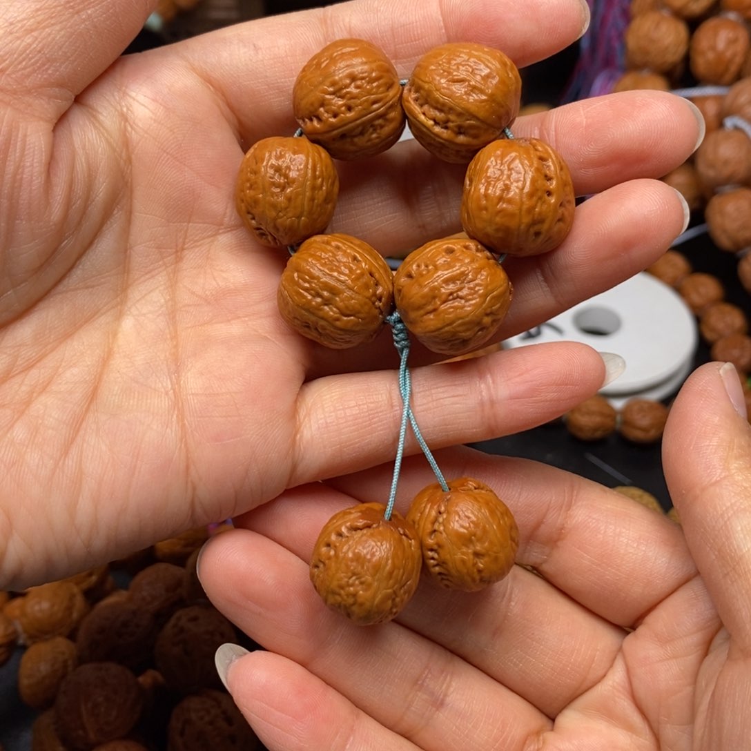 桃核手串光头绕指柔