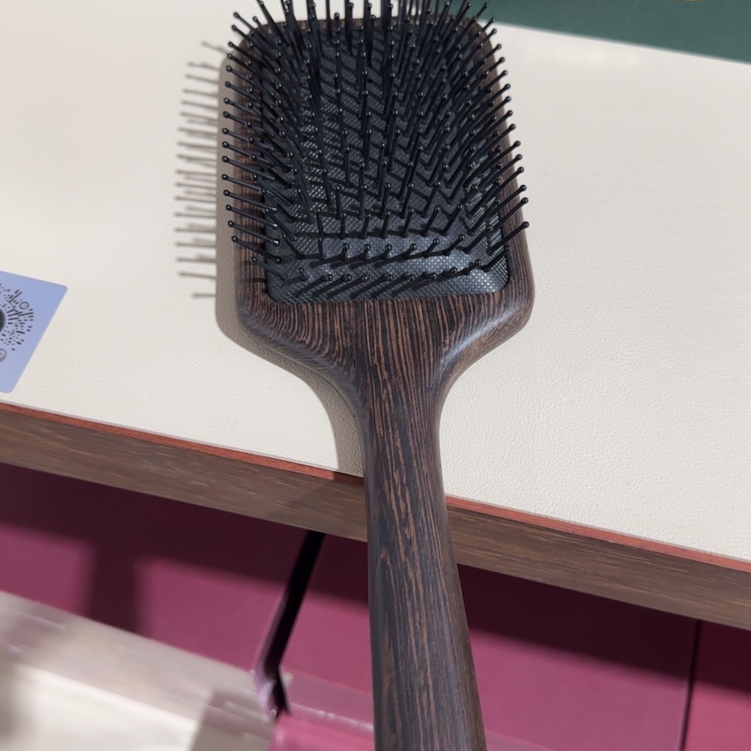 端景台紫檀木类鸡翅木一梳百顺