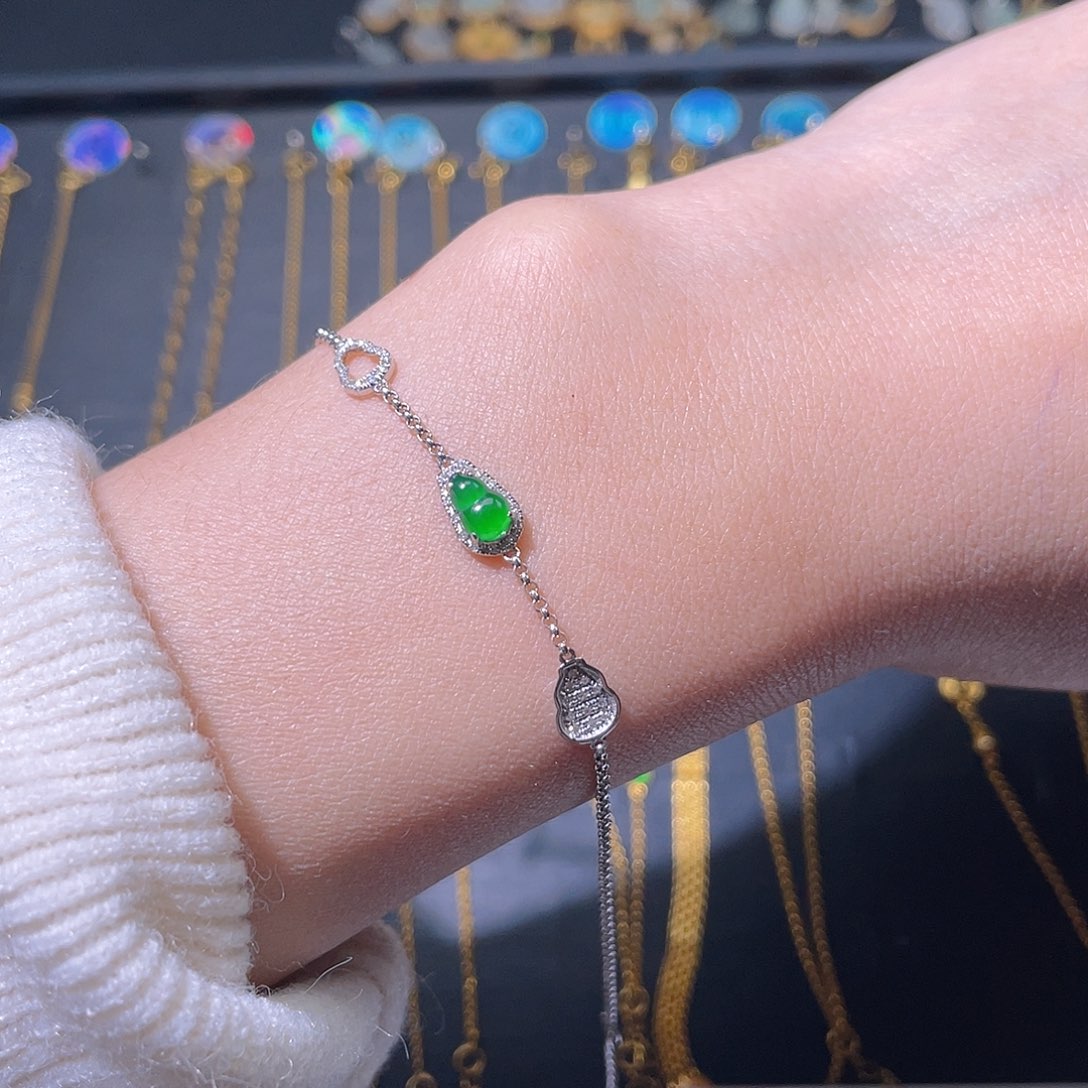 翡翠手链18K金镶嵌朵****痕手链