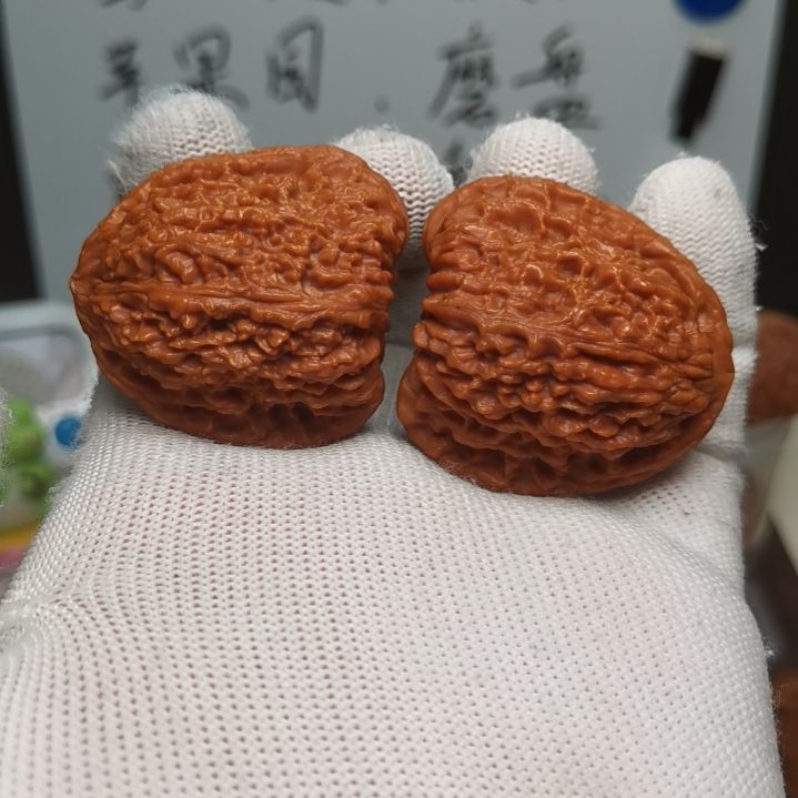 文玩核桃把件39全品逐鹿南疆石红皮高炮凹底