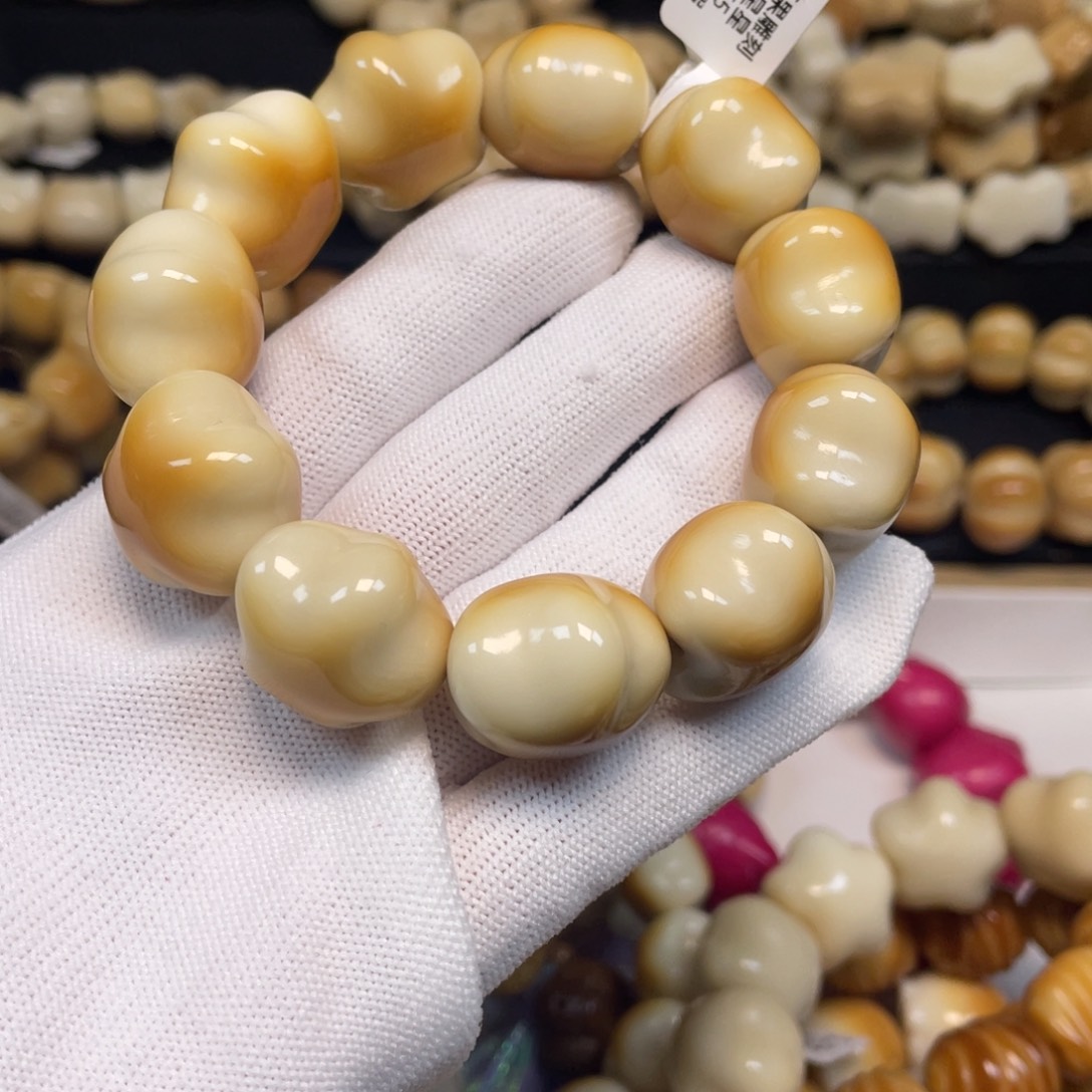 喜****手串菩提根/象牙果102碳烧星星微瑕