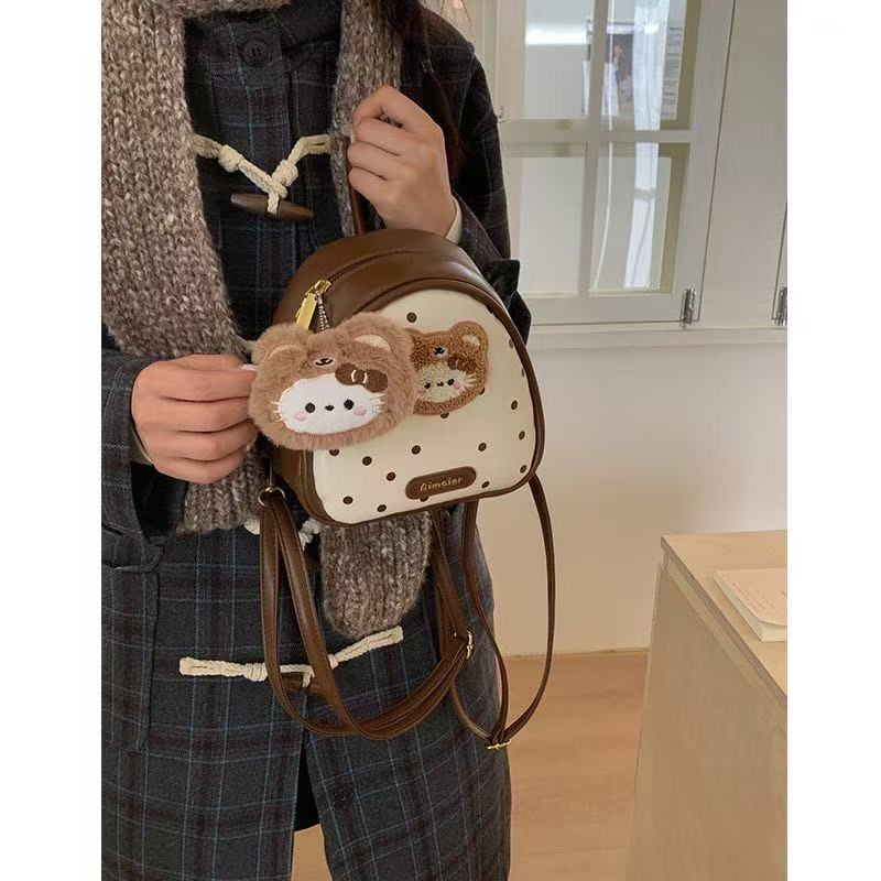 2025冬季新款可爱小熊kt波点百搭小众设计学院新款通勤双肩背包