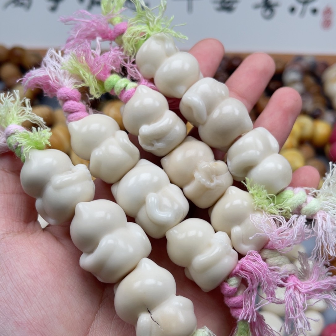 吊坠菩提根/象牙果T29-2拜佛猫20-25瑕疵一串随机