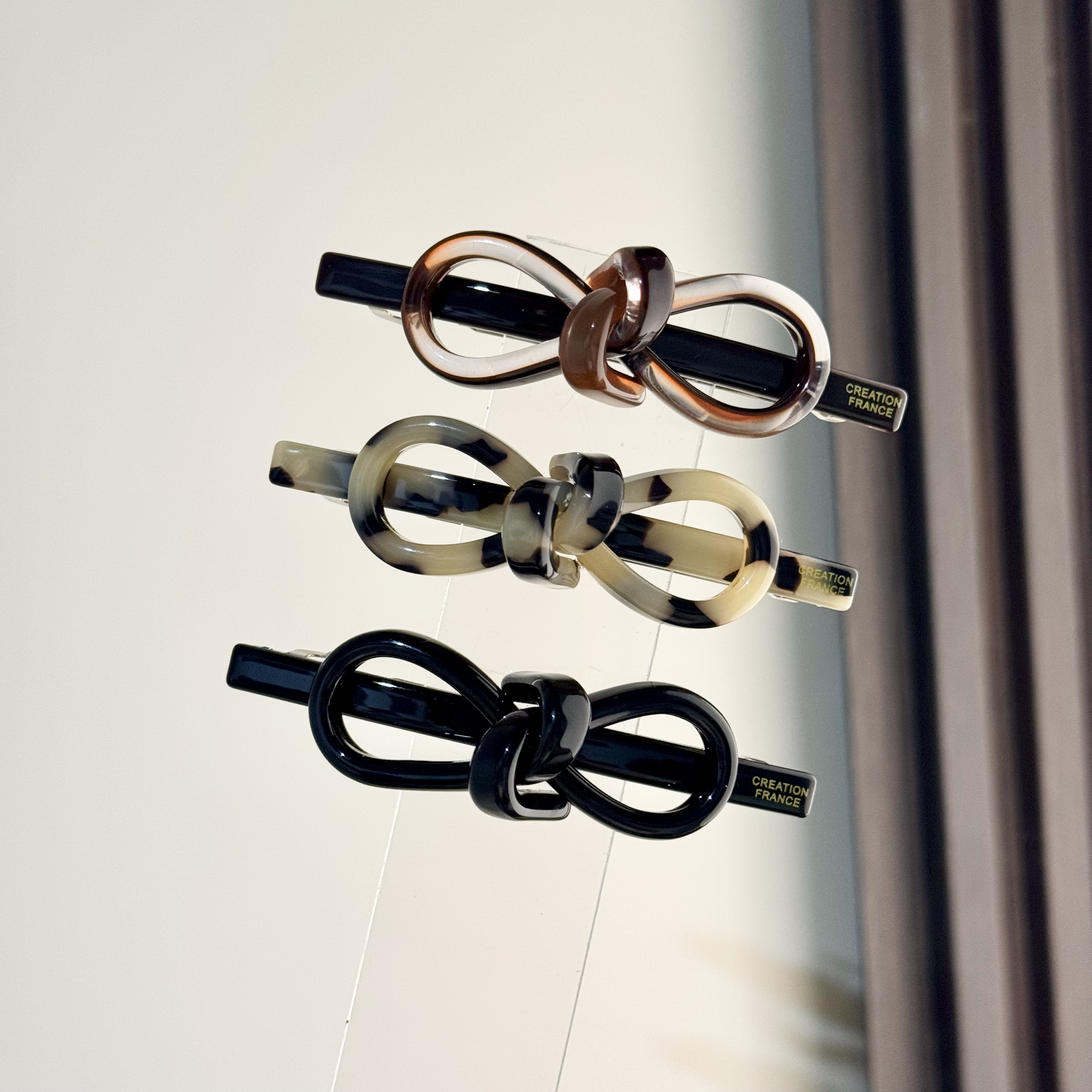 东大门 韩系新款扭扭蝴蝶结弹簧夹气质精致高级2010