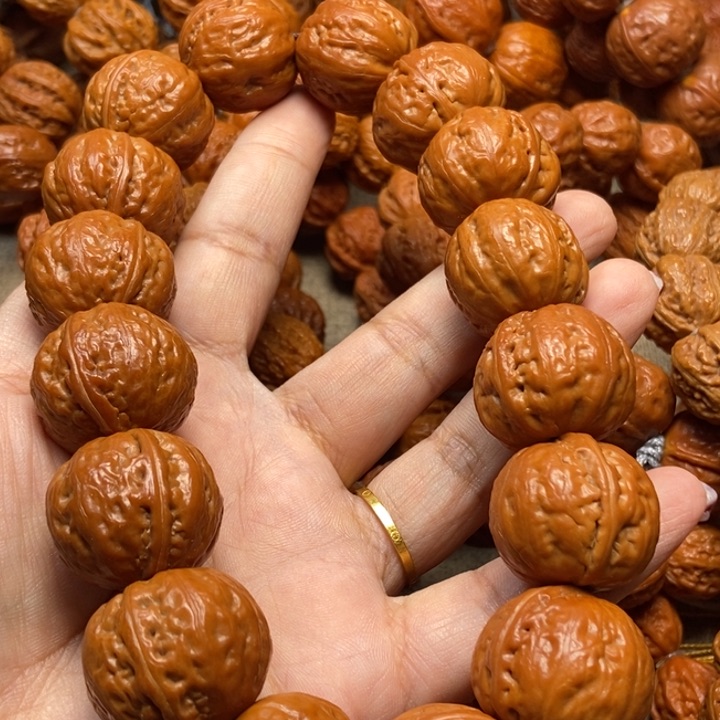 文玩核桃吊坠光头元宝手持