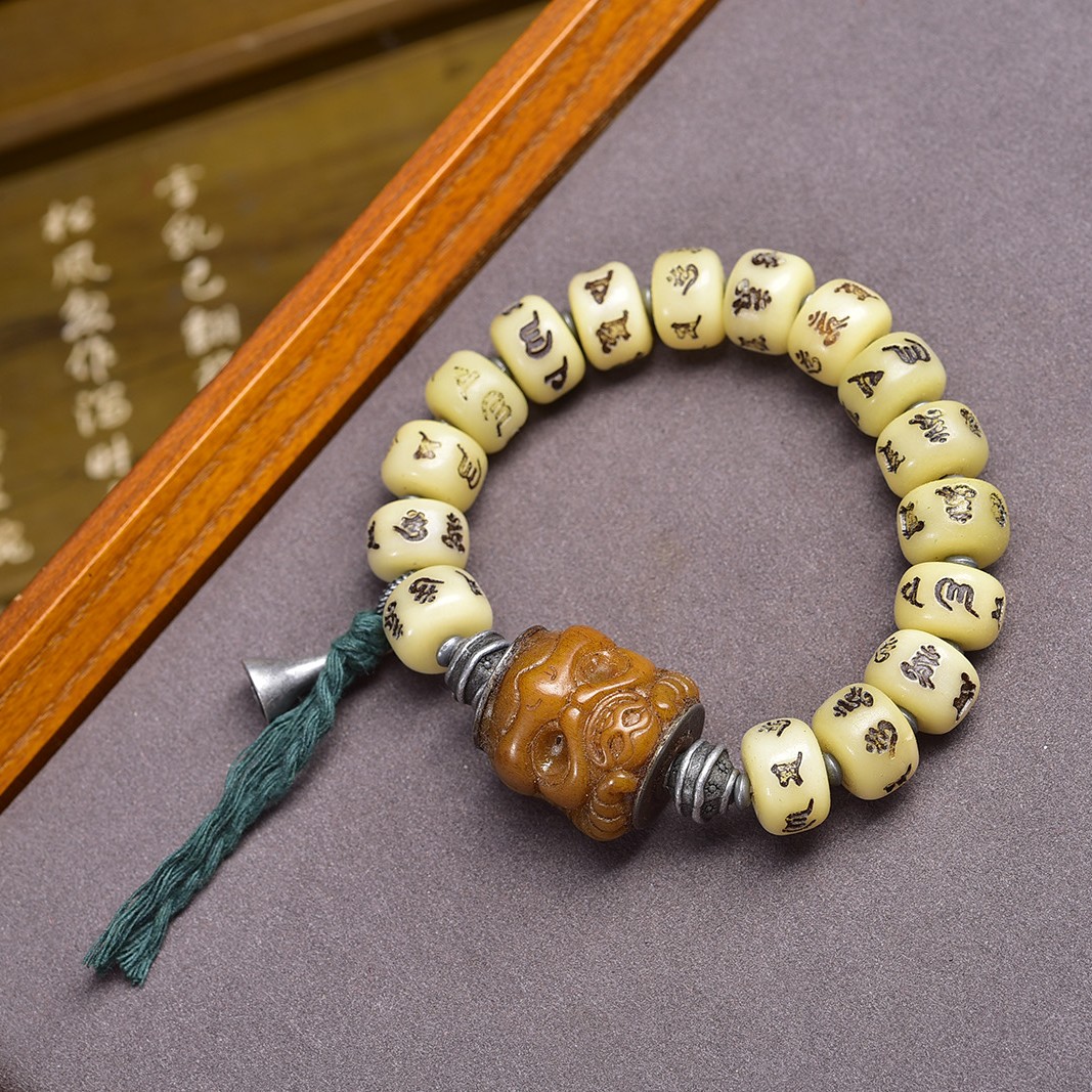 藏传骨艺六字真言大鹏鸟手串揉骨如玉