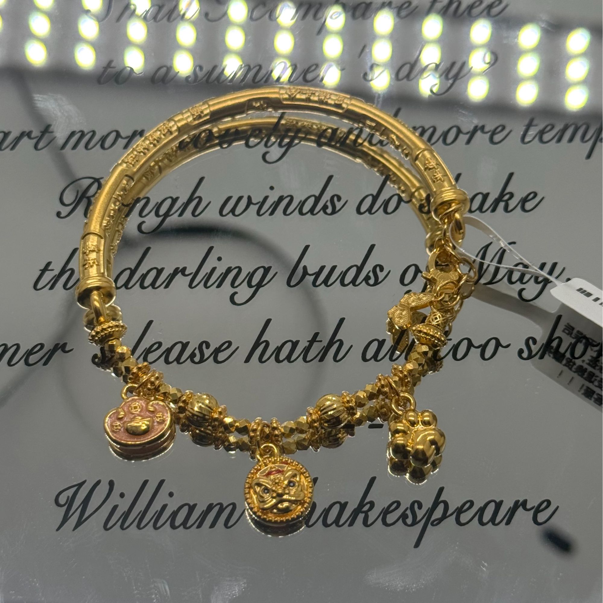 足金999珐琅彩醒狮元.宝弯管手链  12050001
