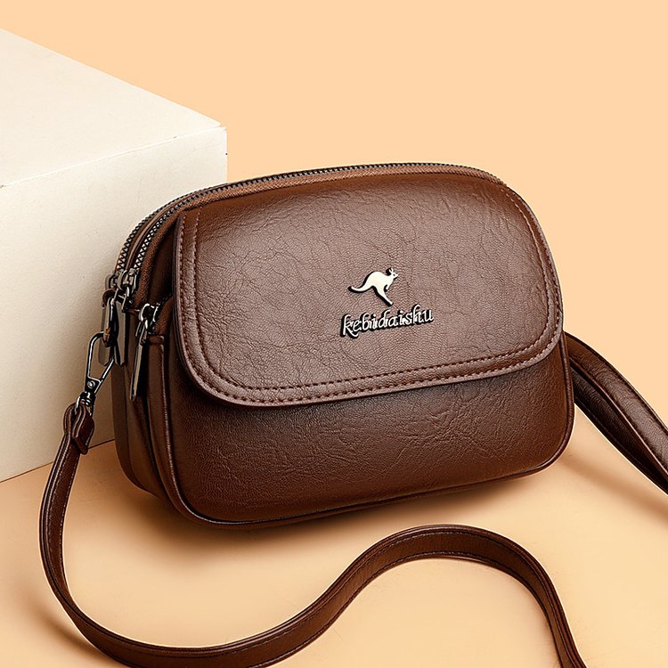 真皮质感包包女2025年爆款时尚潮流斜挎单肩中年妈妈软皮三层小包