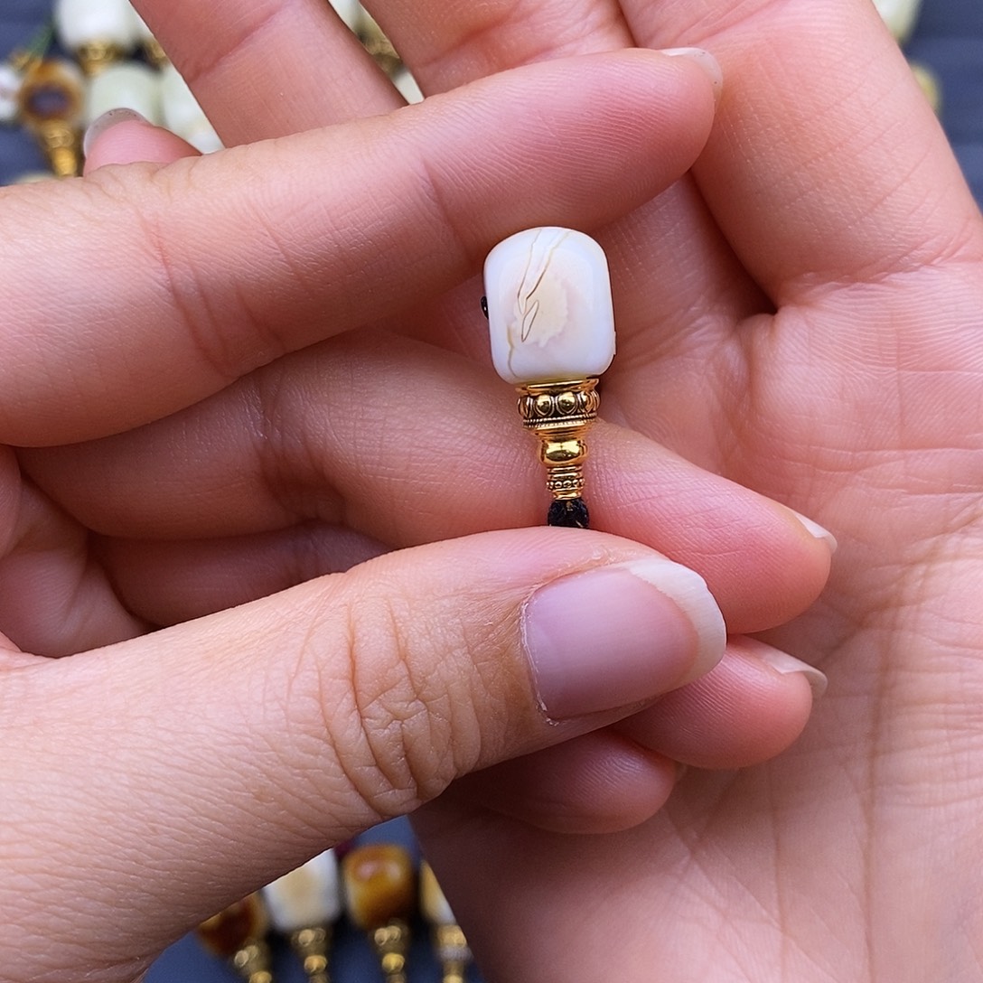 一***回琥珀18K金镶嵌裸石10mm 蜜蜡三通