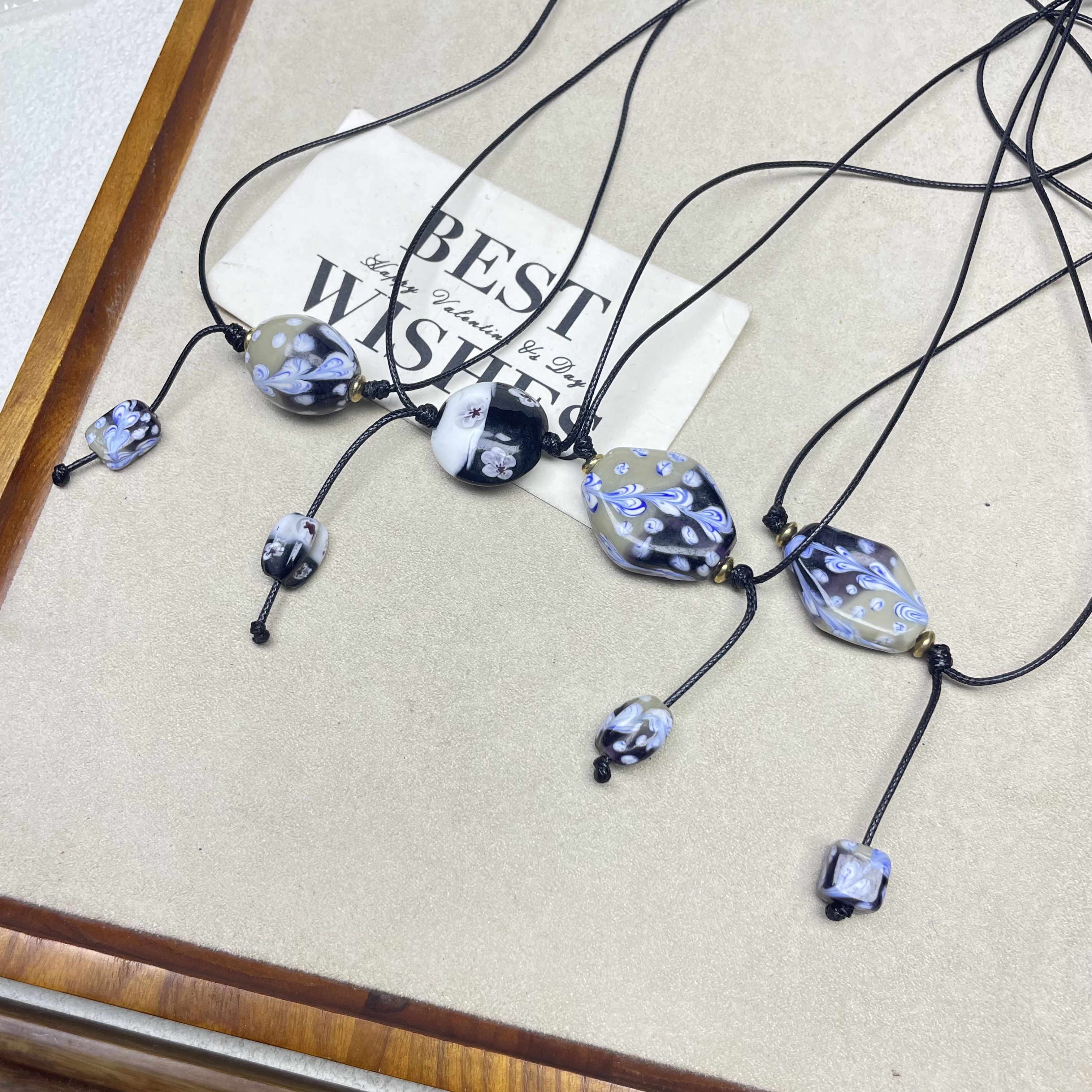 合金项链 LZ6904 黑白小花扁珠单颗珠绳编琉璃项链 孤品合集