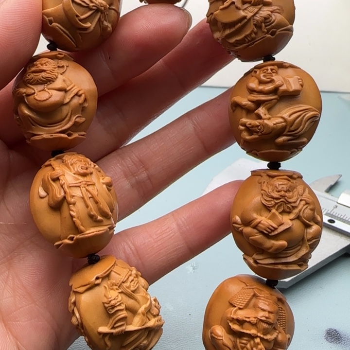 橄榄核手串雕刻工艺