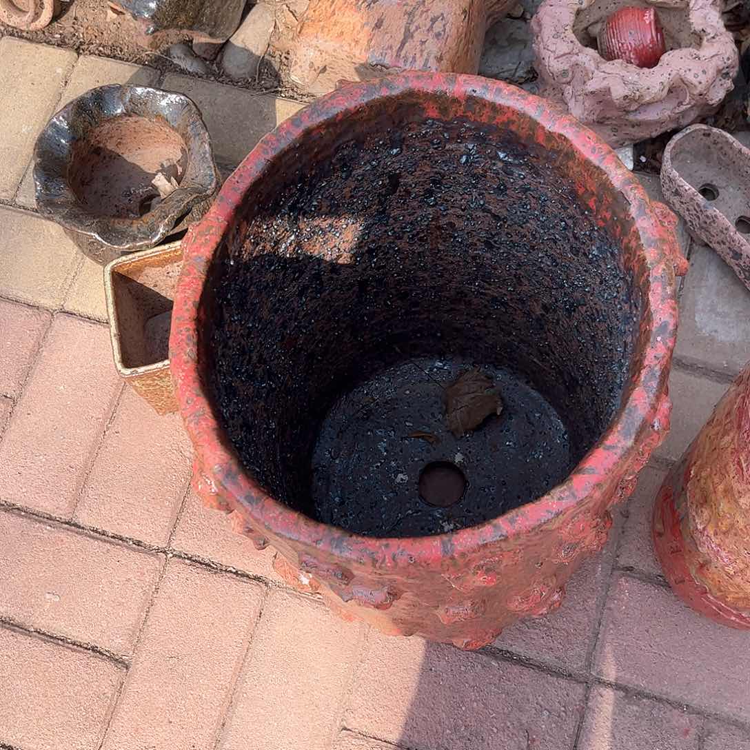 泥塑就**事古镇炻陶换盆