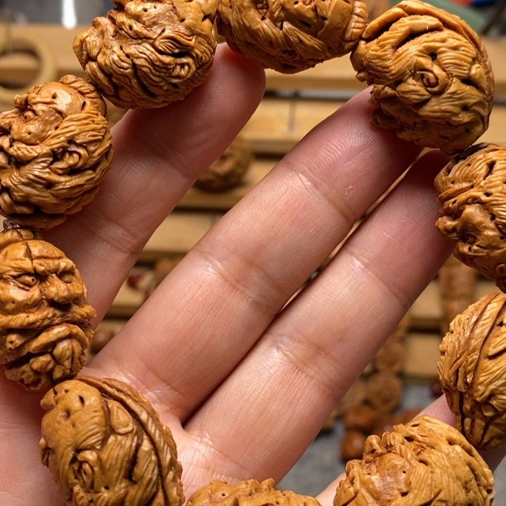 锐****桃核手工雕刻钟馗头手串