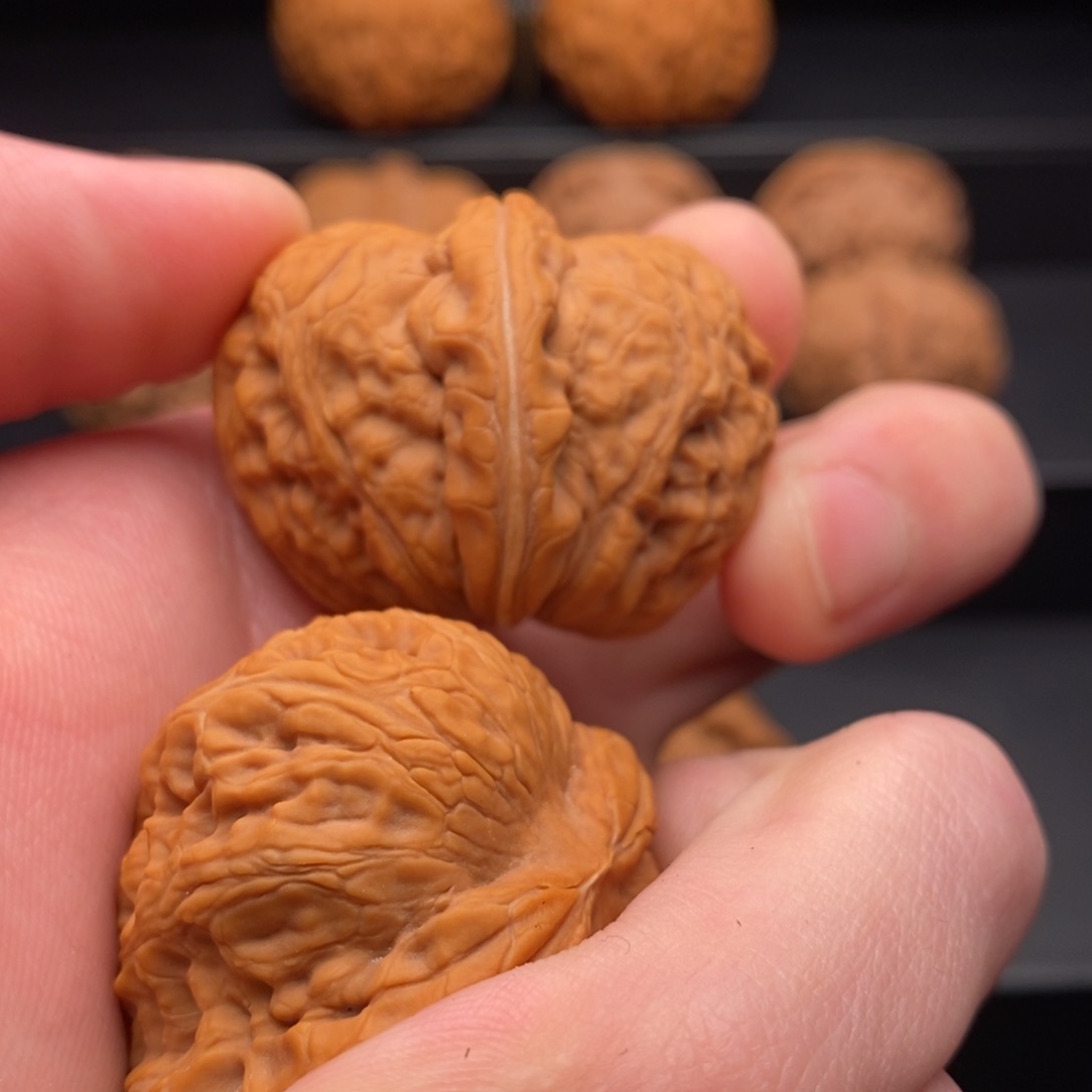 文玩核桃把件超**木元宝