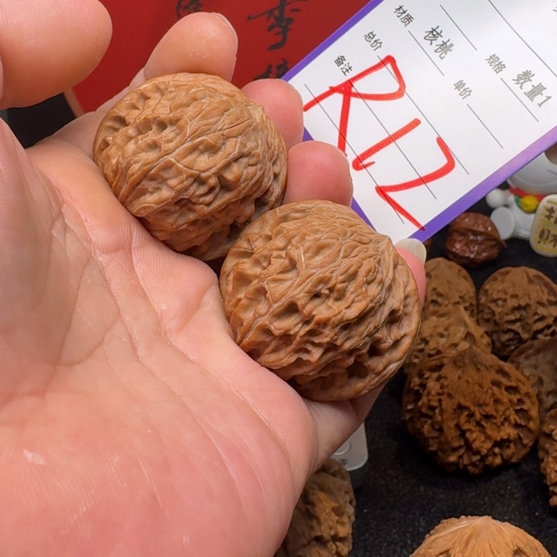 文玩核桃把件是**呀磨盘