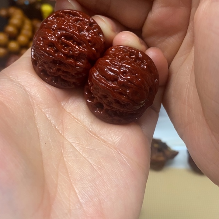 行***子文玩核桃吊坠磨盘