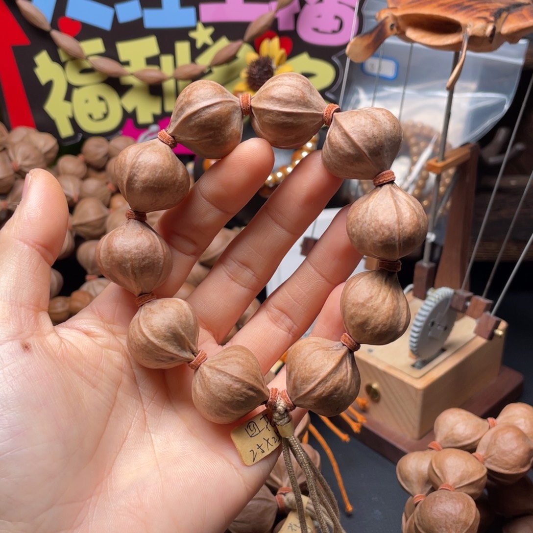 武***林橄榄核吊坠2525四花铁核