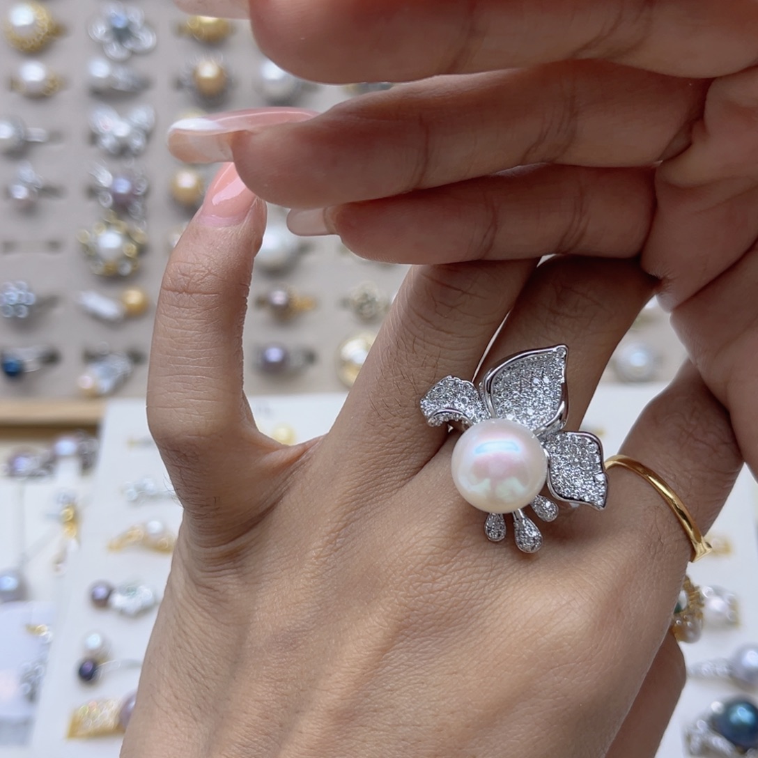 辣****淡水珍珠合金戒指