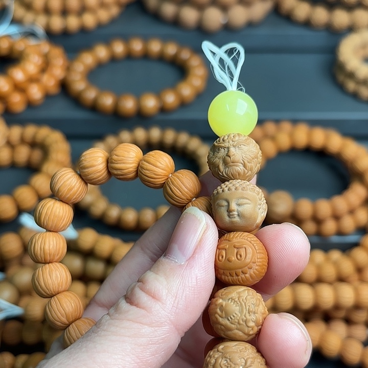 用***5吊坠猴头核桃告诉他中央音乐学院