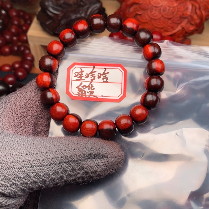 哇***哈木10×11老型极致黑飘红单圈