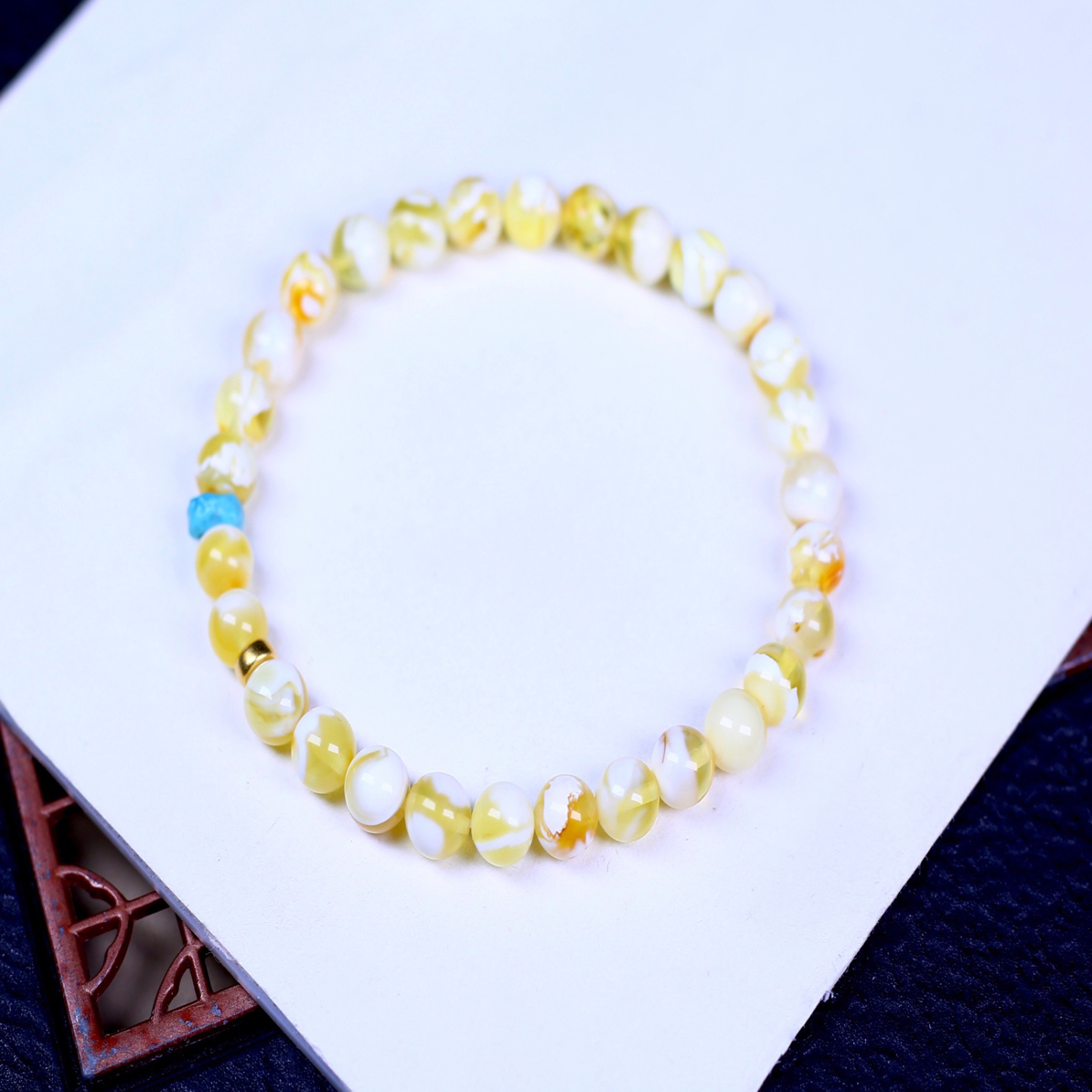 6mm+瓷金白圆珠蜜蜡手串