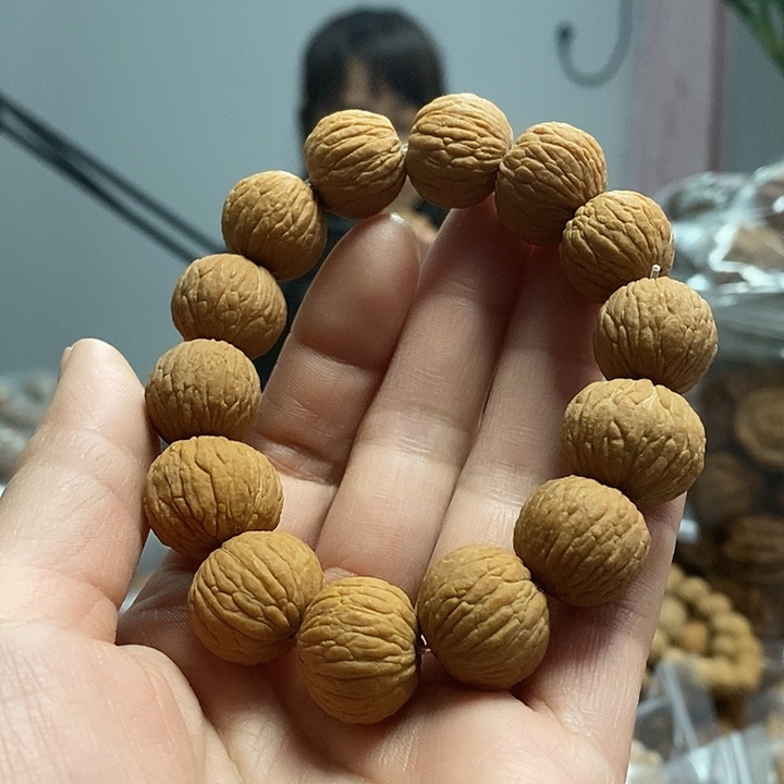 把件文玩核桃凤羽手串